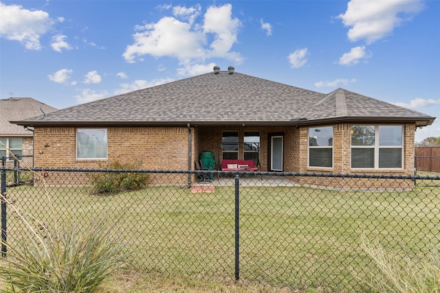 rear view of property with an outdoor hangout area and a lawn