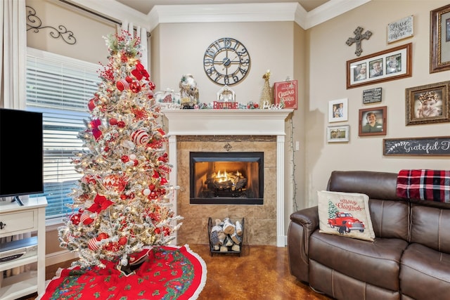 living room featuring a tiled fireplace and ornamental molding