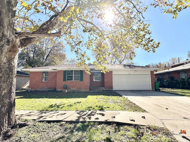 single story home with a garage and a front lawn