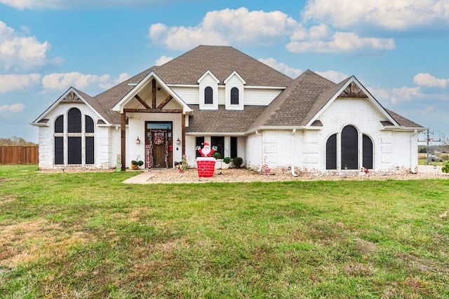 view of front of home with a front lawn