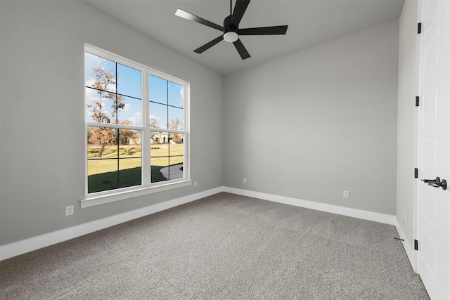 spare room with carpet flooring and ceiling fan