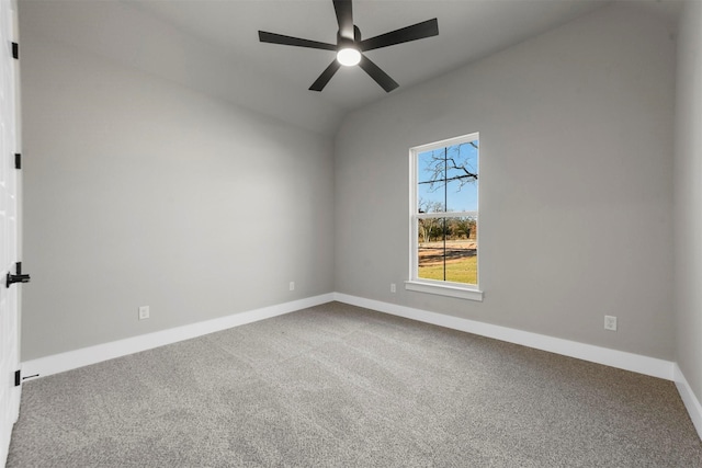 spare room with ceiling fan, carpet floors, and lofted ceiling