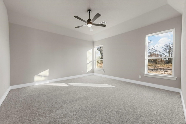 spare room with carpet floors and ceiling fan