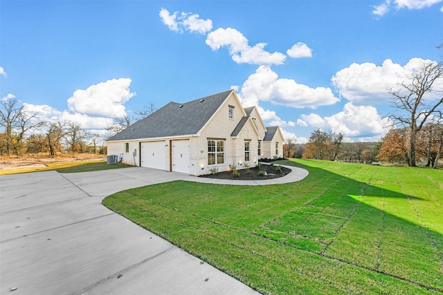 view of home's exterior with a lawn, central AC unit, and a garage