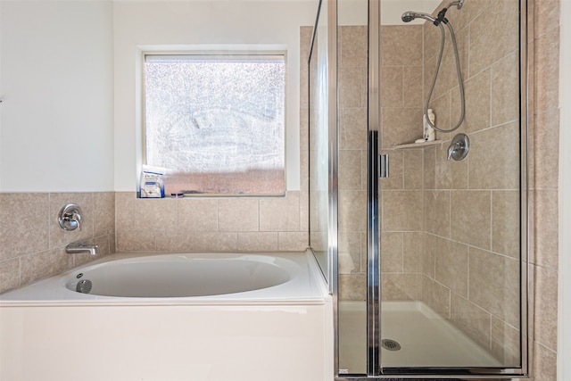 bathroom with independent shower and bath