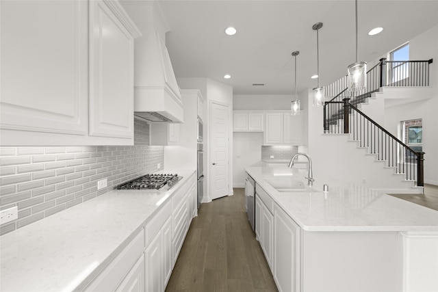 1536 Euclid Aly, Corinth, TX 76208 - kitchen featuring a sink, appliances with stainless steel finishes, dark wood finished floors, white cabinetry, and recessed lighting