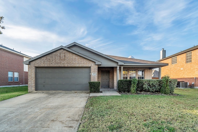 ranch-style home featuring cooling unit, a front lawn, and a garage