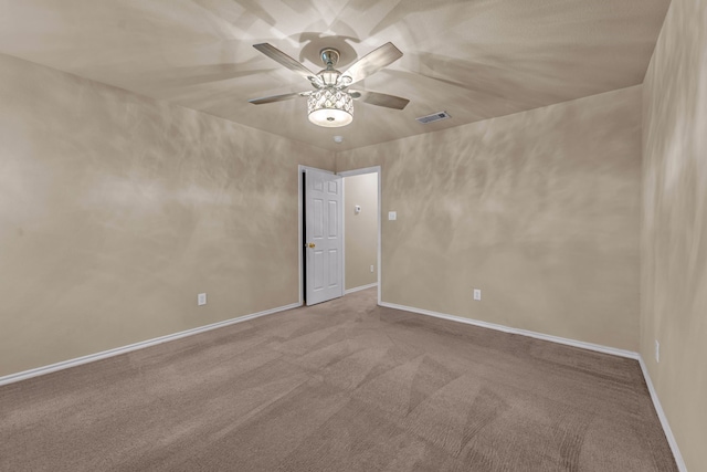 empty room with light carpet and ceiling fan