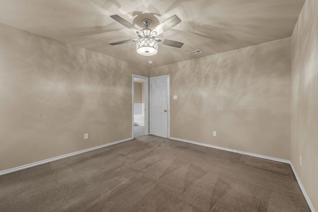 carpeted empty room with ceiling fan