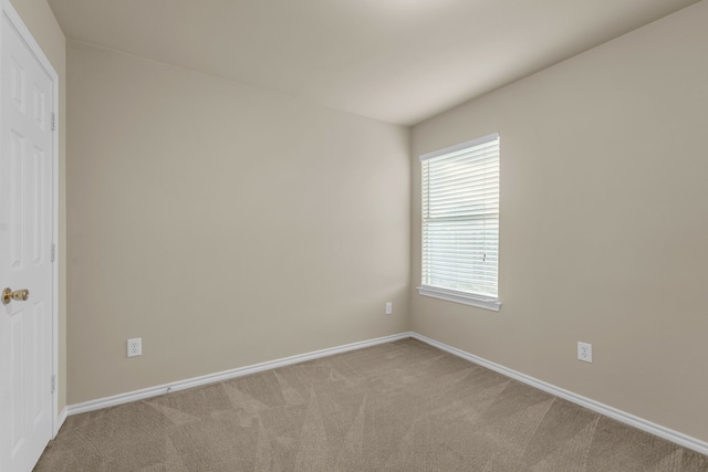 view of carpeted spare room