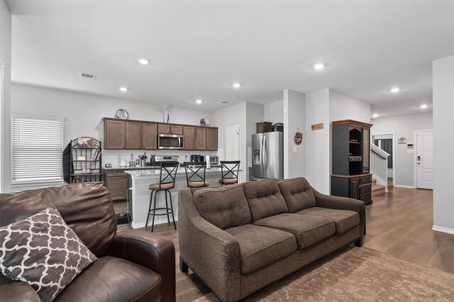 living room with hardwood / wood-style floors