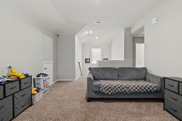 living room with carpet and vaulted ceiling