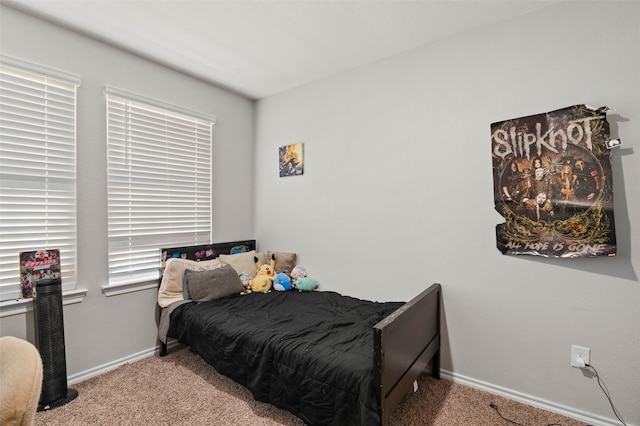 bedroom with light carpet