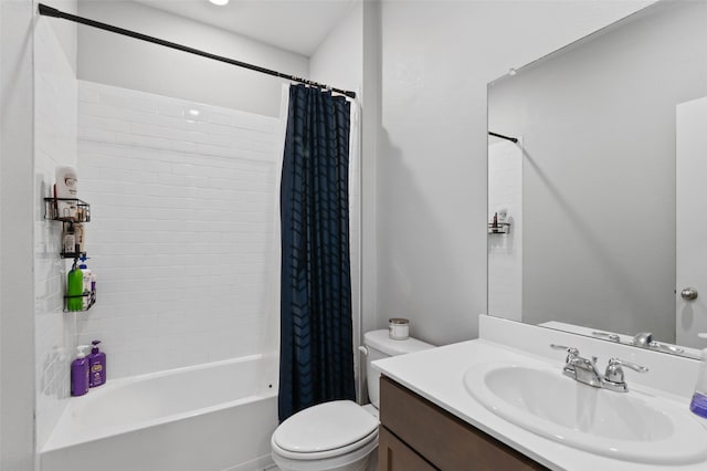 full bathroom featuring vanity, shower / bath combo, and toilet