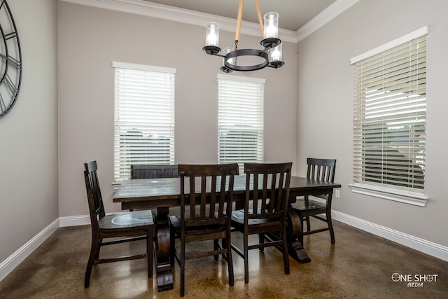 dining room with a chandelier and crown molding