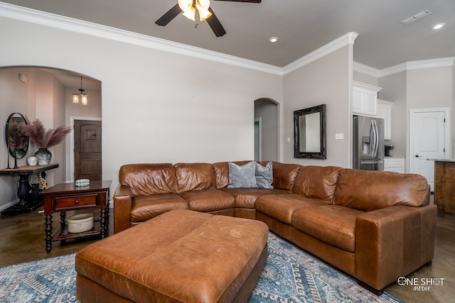 living room featuring crown molding and ceiling fan