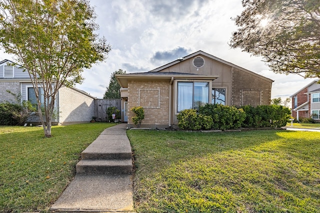 view of front of house with a front lawn