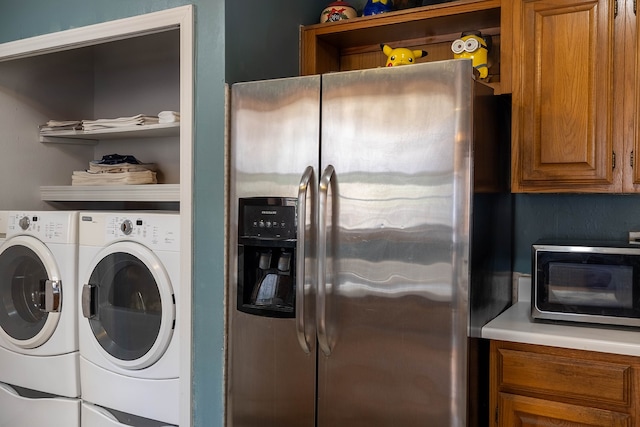 laundry area with washer and clothes dryer