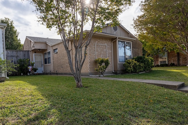 exterior space with a yard