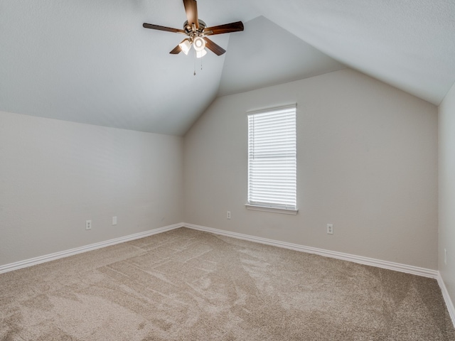 bonus room featuring carpet floors, ceiling fan, and lofted ceiling