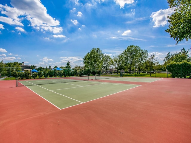 view of sport court featuring basketball hoop