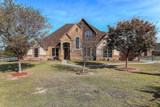 view of front of home with a front lawn