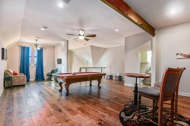 game room with billiards, ceiling fan, hardwood / wood-style floors, lofted ceiling with beams, and a textured ceiling