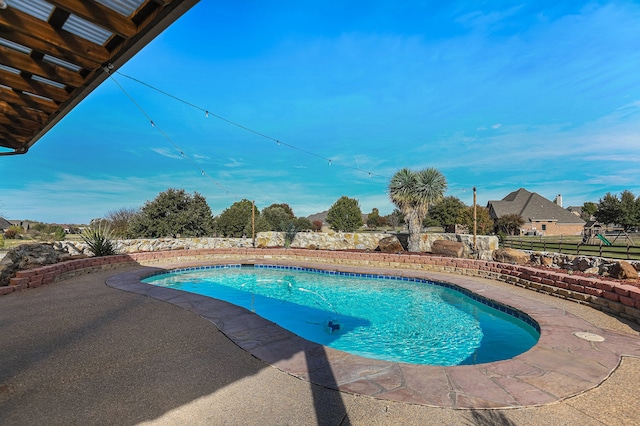 view of pool with a patio