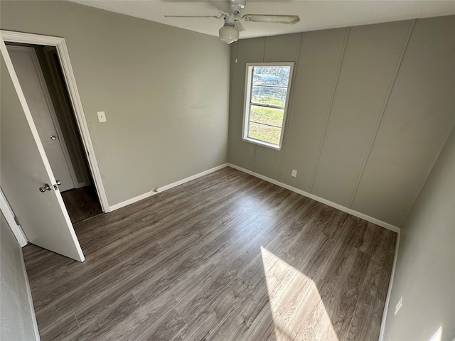 unfurnished room featuring ceiling fan and wood-type flooring