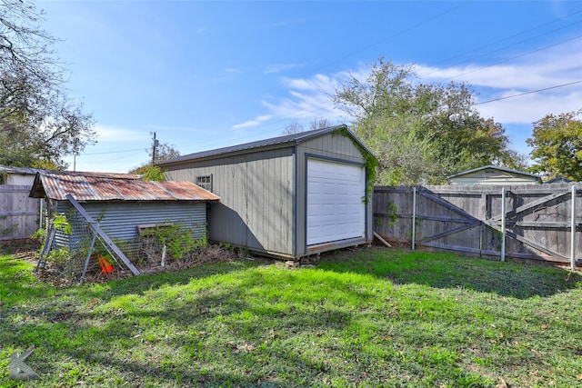 view of outbuilding featuring a yard