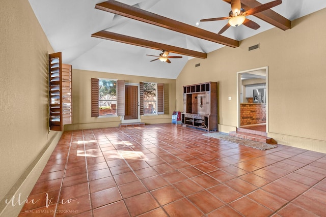 unfurnished living room featuring tile patterned flooring, ceiling fan, high vaulted ceiling, and beam ceiling