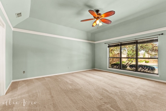 carpeted empty room with lofted ceiling and ceiling fan