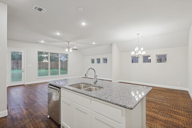 kitchen with white cabinetry, sink, hanging light fixtures, stainless steel dishwasher, and ceiling fan with notable chandelier