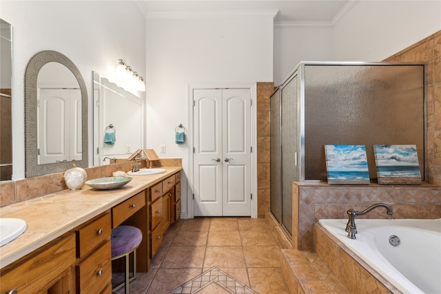 bathroom with tile patterned flooring, vanity, ornamental molding, and independent shower and bath