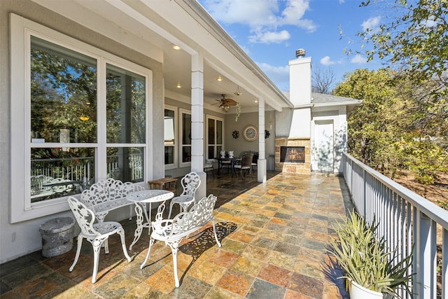 view of patio / terrace featuring ceiling fan