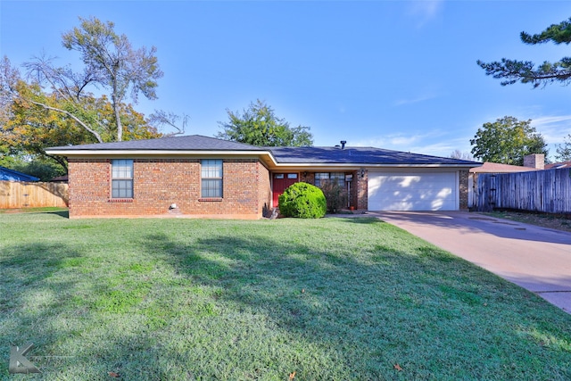 single story home with a garage and a front yard