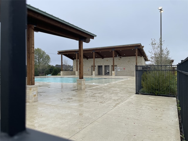 view of pool featuring a patio area