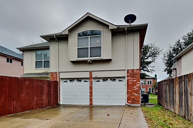 701 Squire Ct, Allen, TX 75002 - view of home's exterior featuring an attached garage and driveway