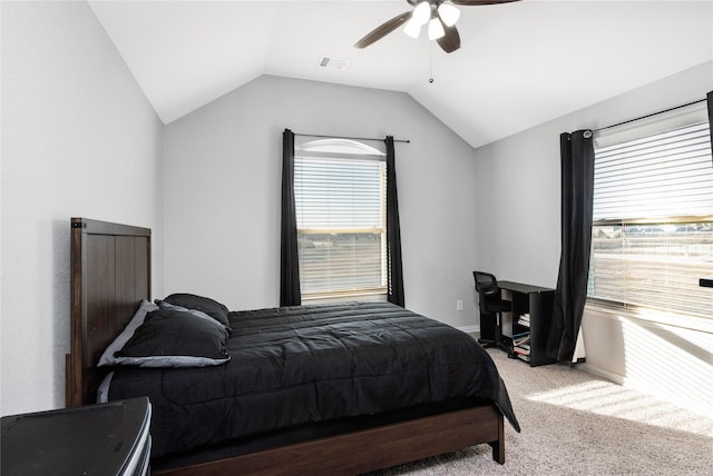 carpeted bedroom featuring ceiling fan and lofted ceiling