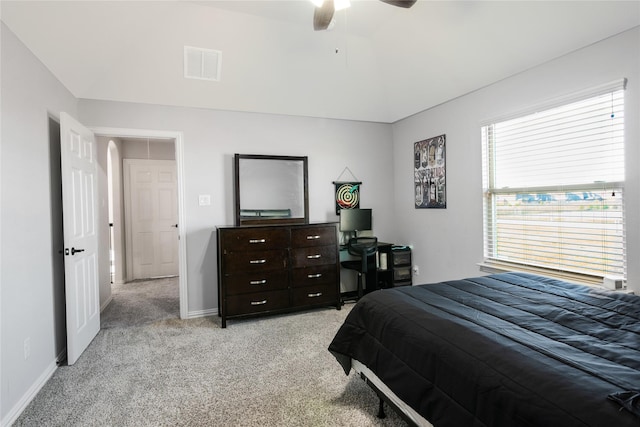 bedroom with ceiling fan and light colored carpet