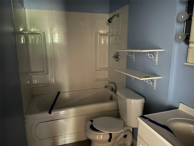 full bathroom featuring bathing tub / shower combination, vanity, and toilet