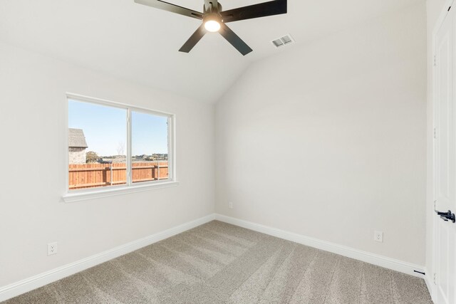 unfurnished room with carpet floors, ceiling fan, and lofted ceiling