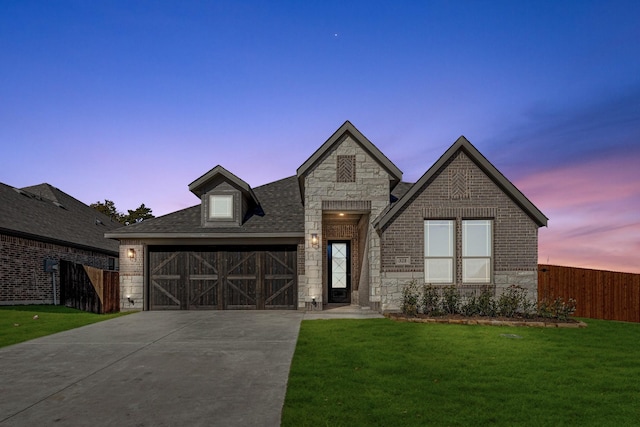 view of front of home featuring a yard