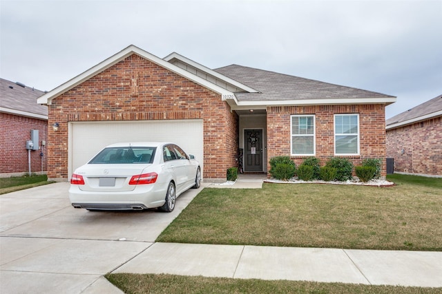 view of front facade featuring a garage and a front lawn