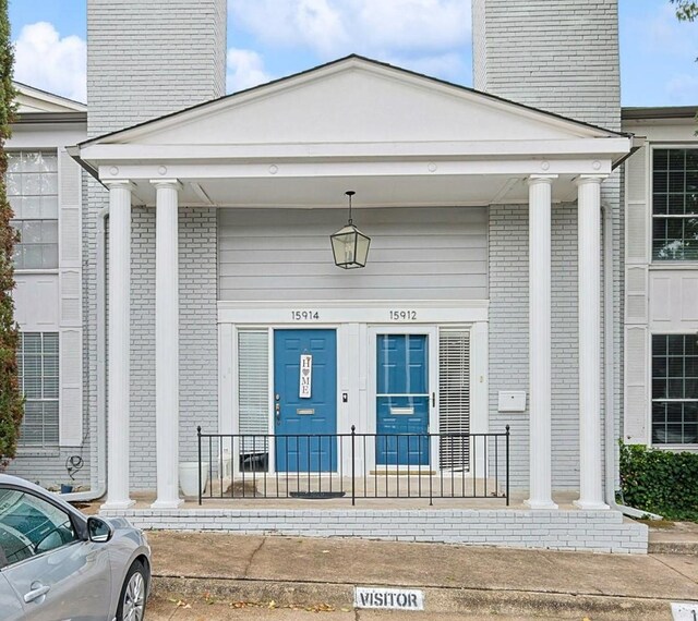 property entrance with a porch