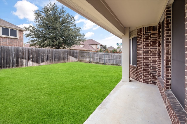 view of yard with a patio area