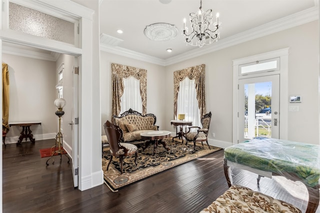 living area featuring crown molding, an inviting chandelier, and dark wood-type flooring