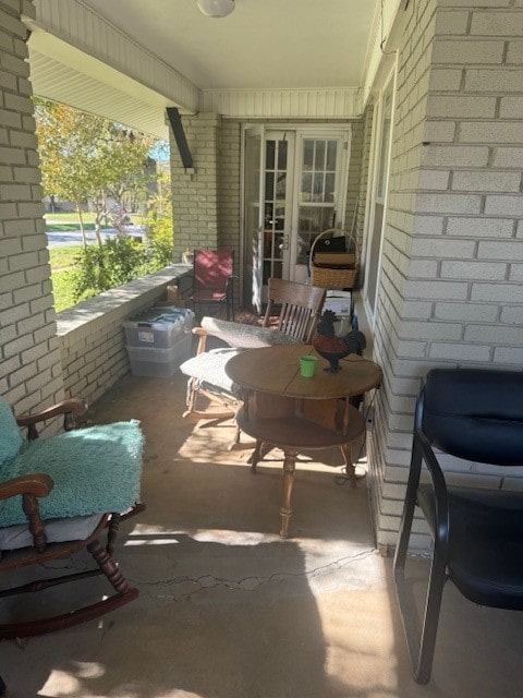 view of patio / terrace with a balcony