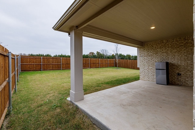 view of yard with a patio area