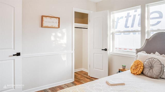 bedroom featuring wood-type flooring